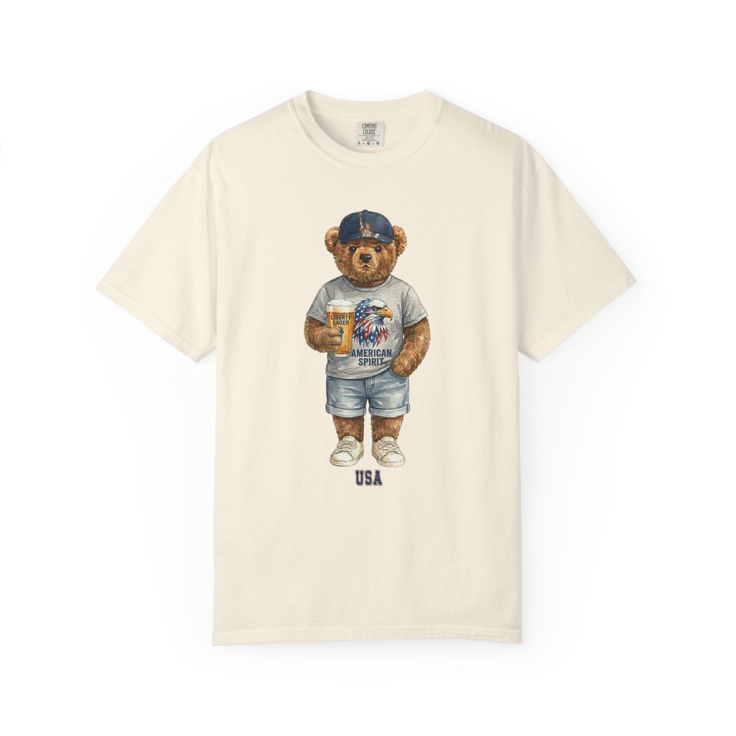 ivory t-shirt with a bear graphic wearing an American flag shirt and shorts on a white background