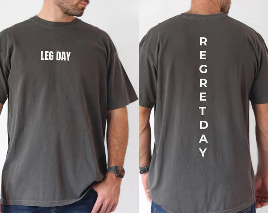 Regret Day Weightlifting Comfort Colors Unisex T-Shirt in Pepper โ soft garment-dyed tee with barbell graphic
