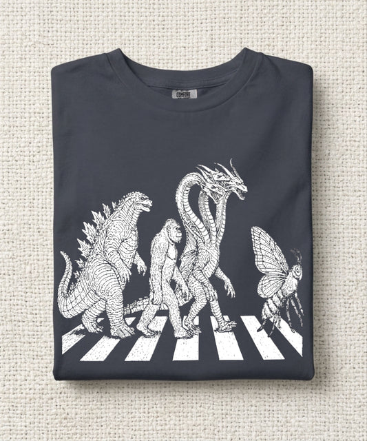 Abbey Road monster parody graphic tee in Navy โ Kaiju, Bigfoot, Hydra and Queen Bee crossing the street