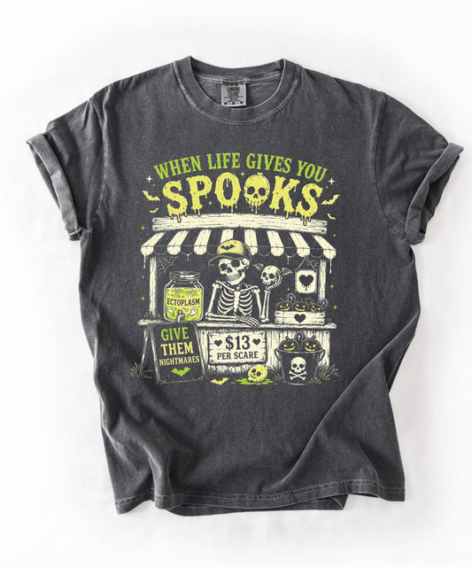 Halloween Skeleton Stand graphic tee in Pepper — goth skeleton t-shirt with "When Life Gives You Spooks" design