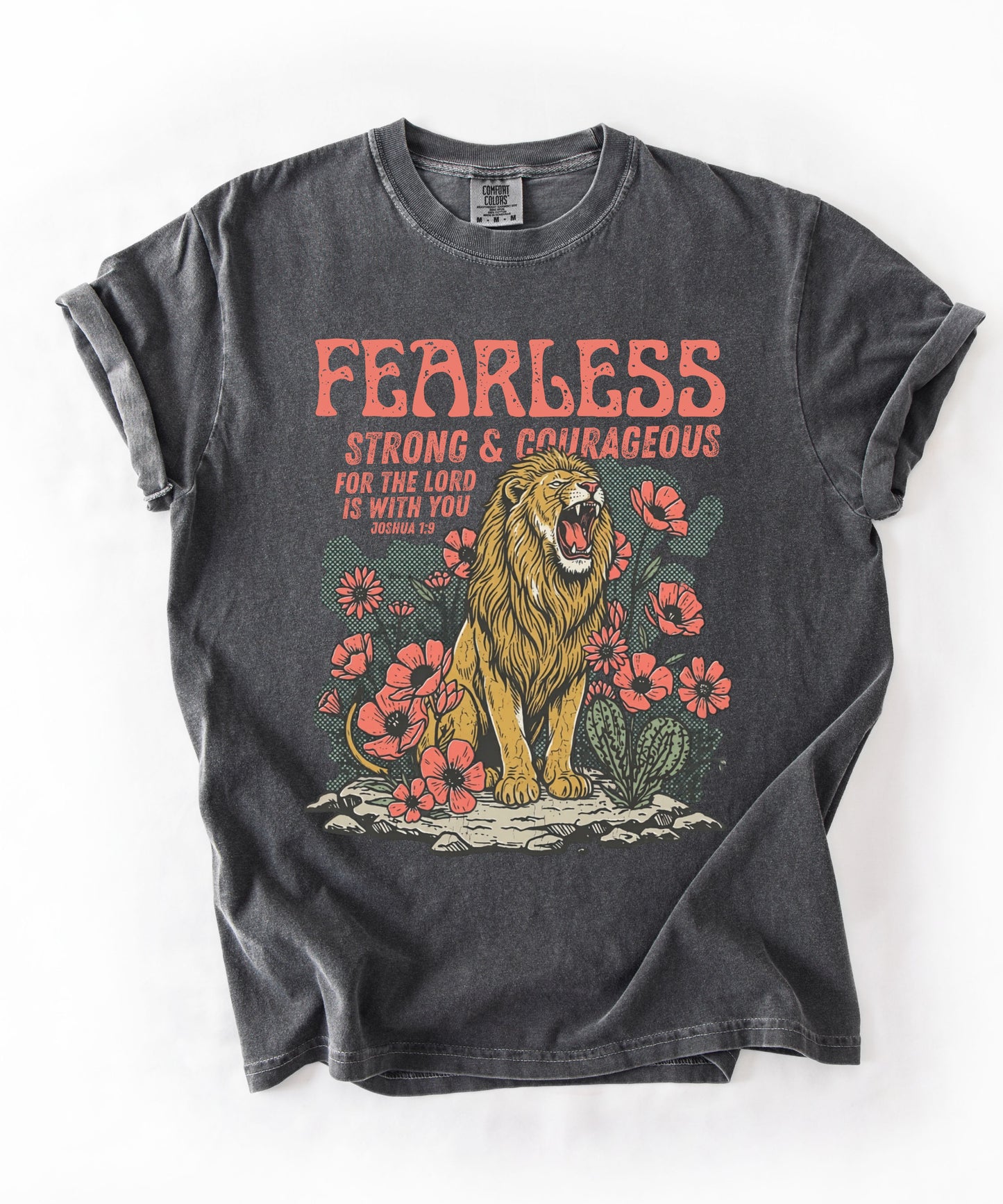 pepper t-shirt with a lion graphic and motivational text fearless strong and courageous on a white background