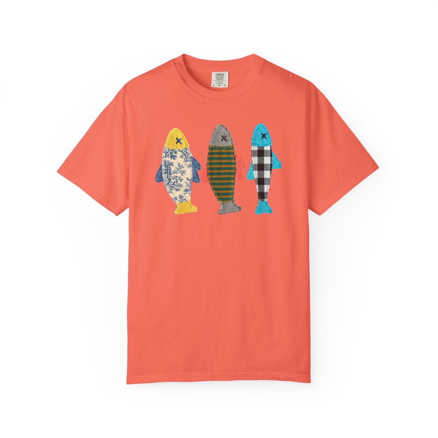 Faux patterned fish trio graphic tee in Bright Salmon showing the floral, stripe, and buffalo-check fish prints — color variant