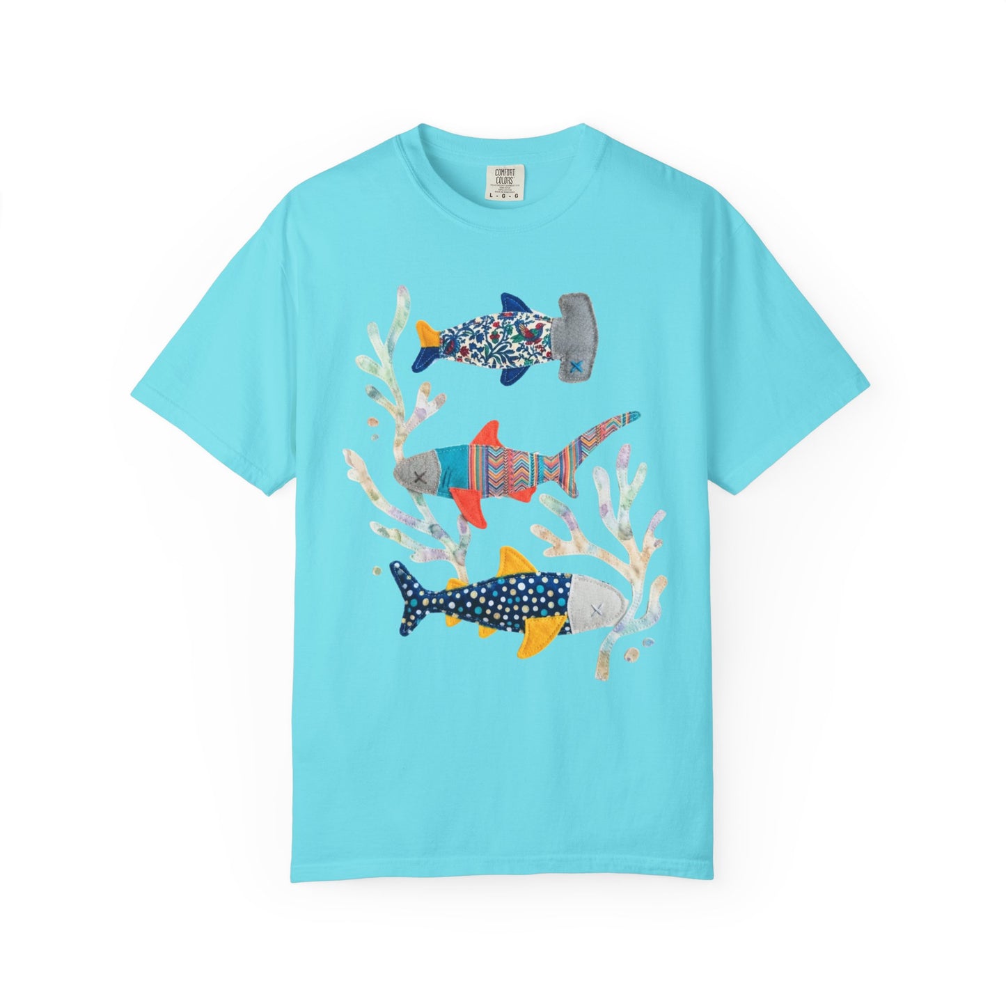 Faux patterned sharks graphic tee in Lagoon Blue showing the hand-painted shark illustration with tidepool textures — color mockup