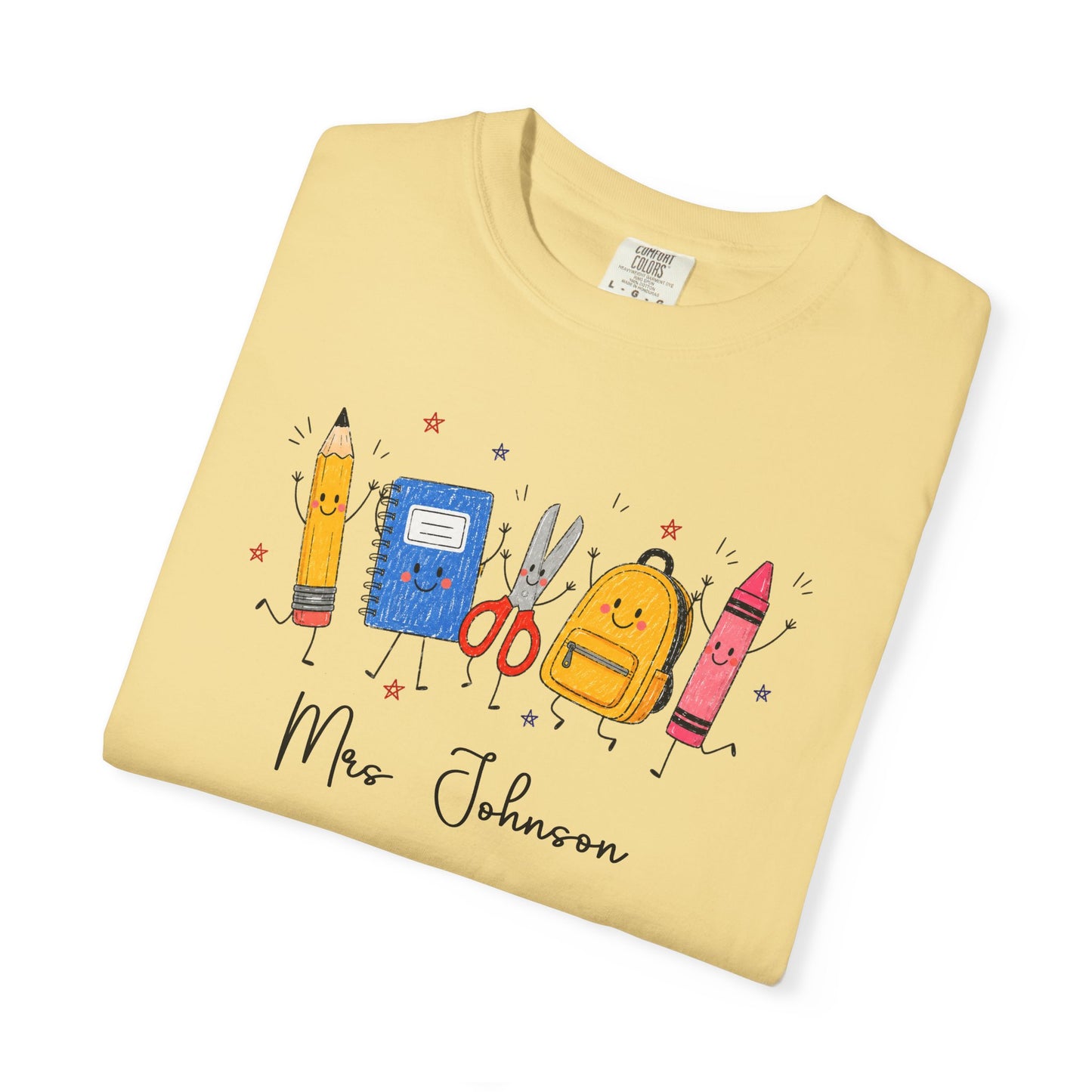 Personalized teacher t-shirt in Butter with custom name printed on front — soft garment-dyed cotton tee, sizes S–4XL
