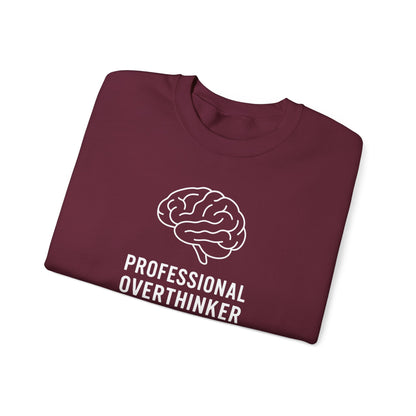 Maroon t-shirt with a brain graphic and 'Professional Overthinker' text on a white background