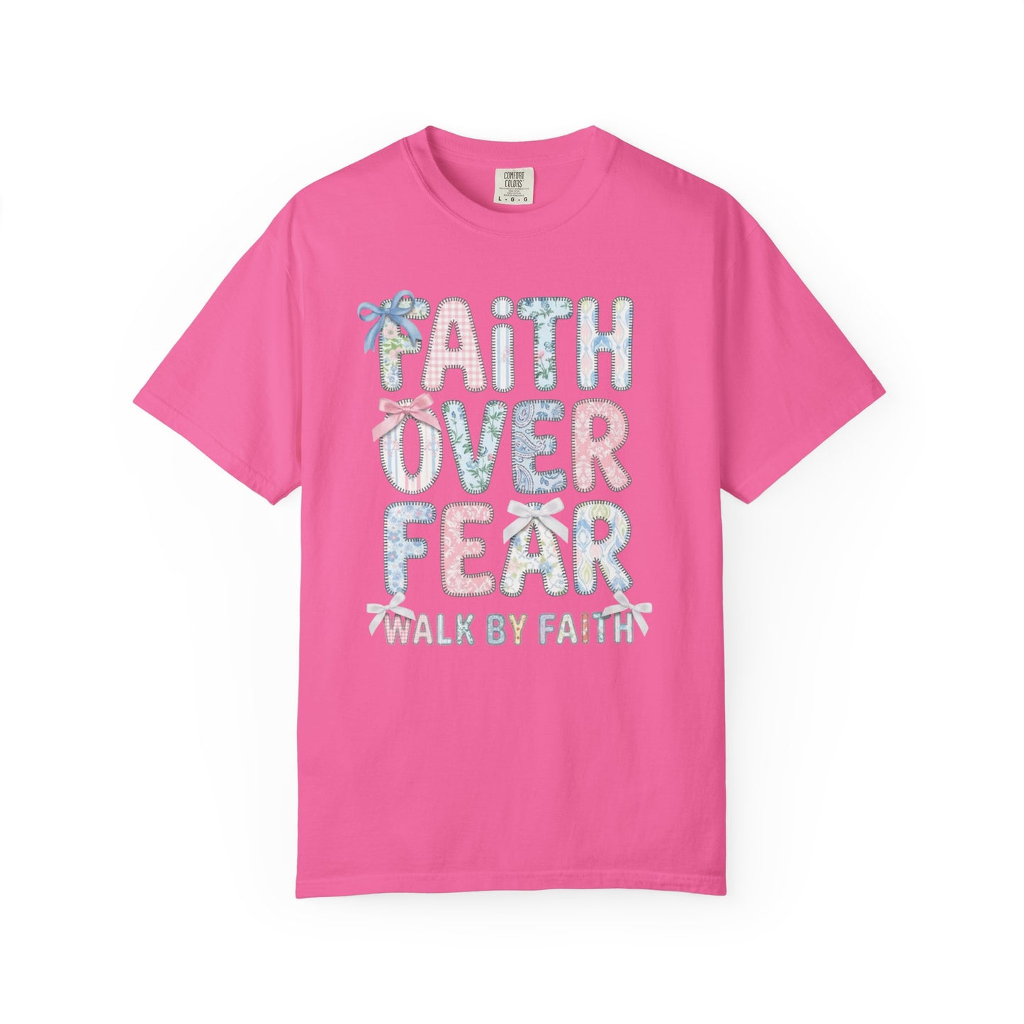 neon pink t-shirt with 'Faith Over Fear' text on a white background
