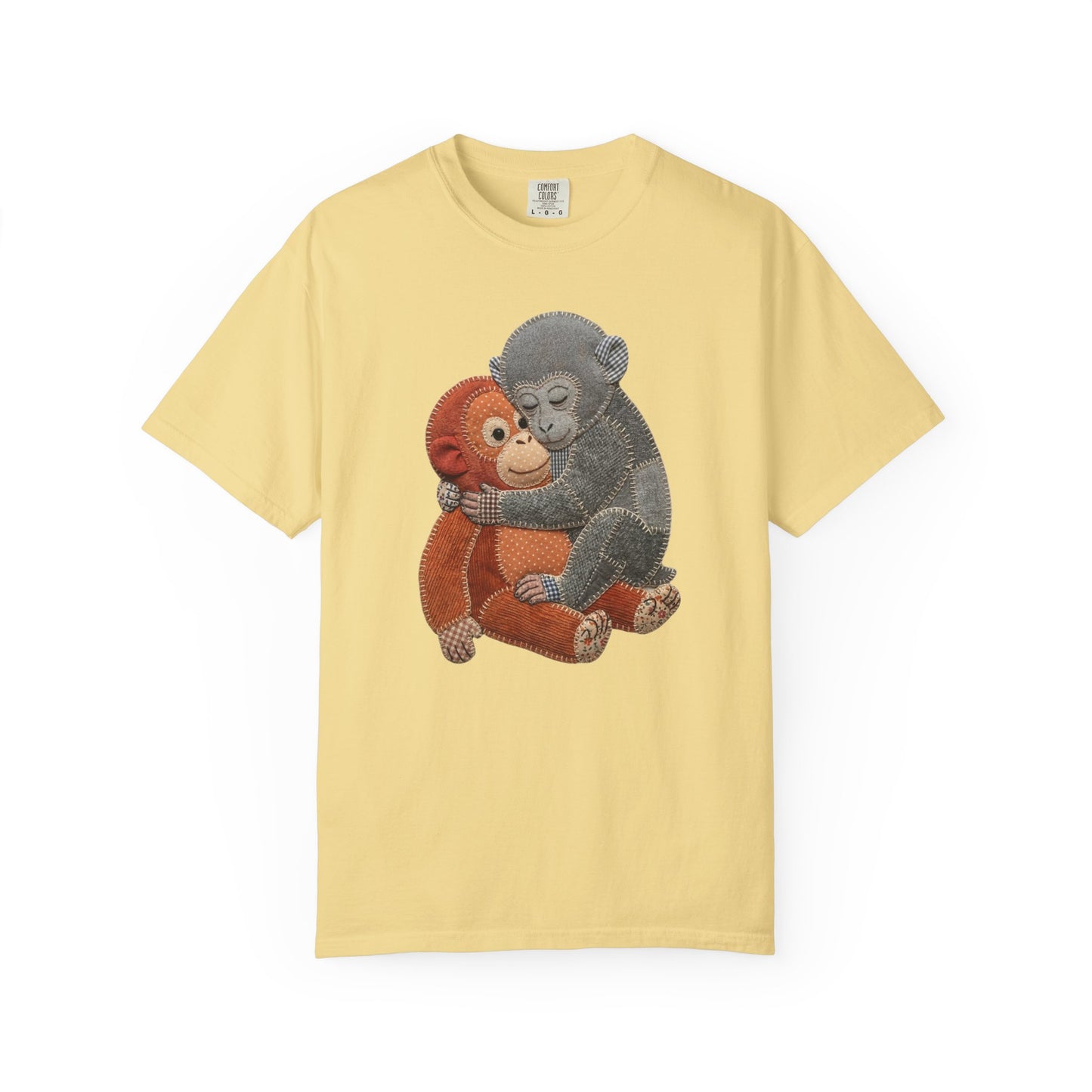butter t-shirt with a graphic of two monkeys hugging on a white background