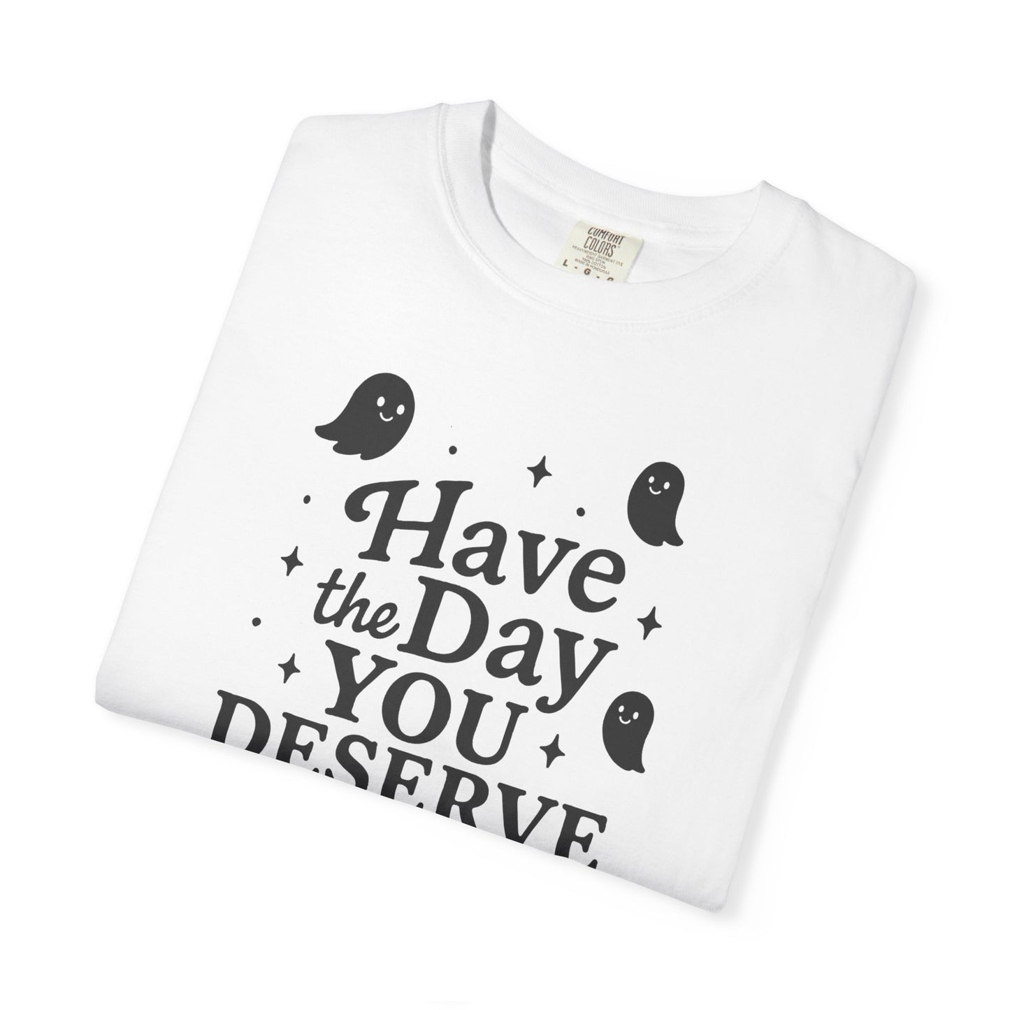 white  t-shirt with Halloween-themed design and text that says "have the day you deserve" on a white background
