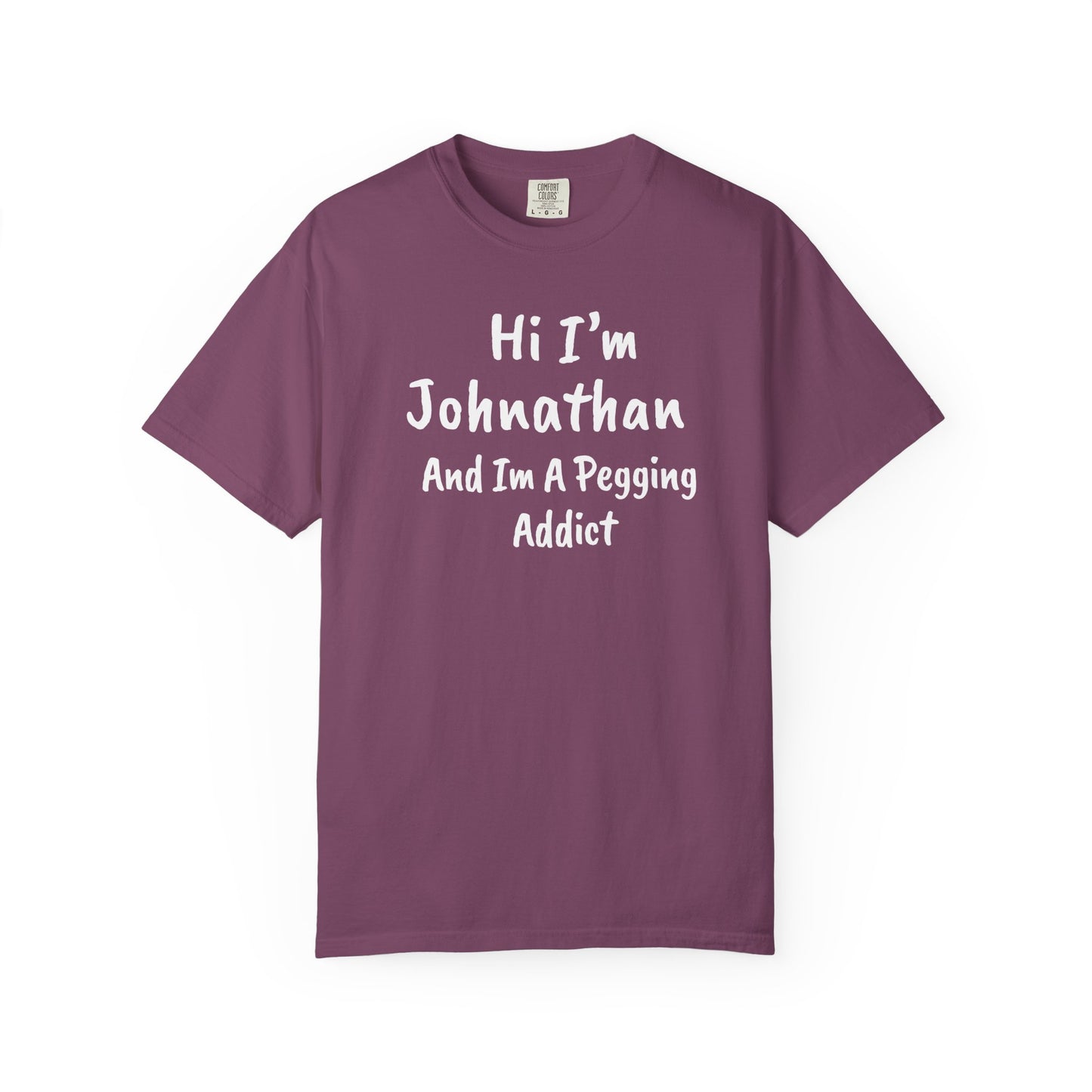 Berry garment-dyed heavyweight t-shirt with personalized 'Hi I'm [Name] And I'm A Pegging Addict' graphic in handwritten-style font, centered on chest