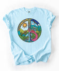 Scenic peace sign T-shirt with mountain valley and winding road graphic in Chambray