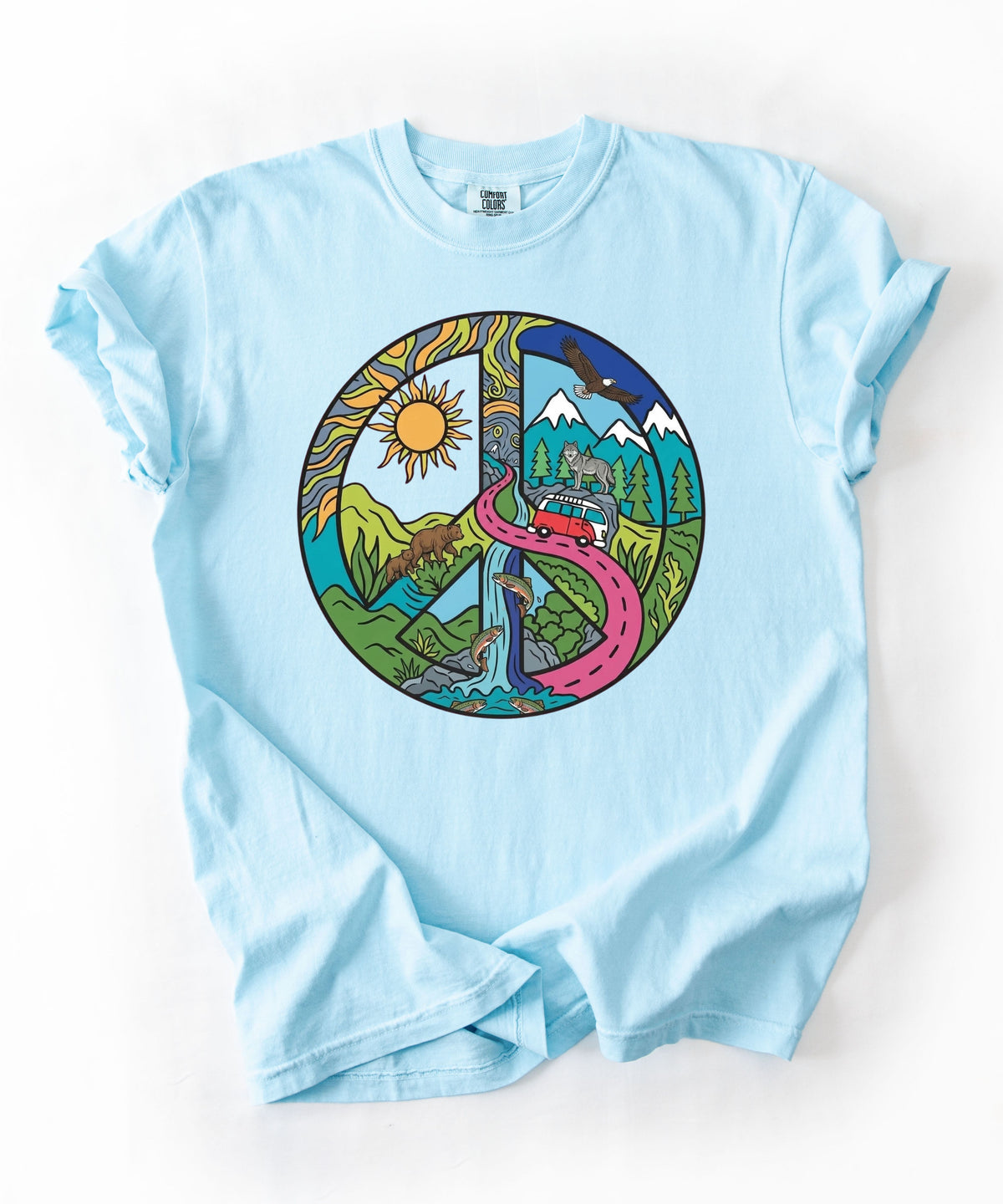 Scenic peace sign T-shirt with mountain valley and winding road graphic in Chambray