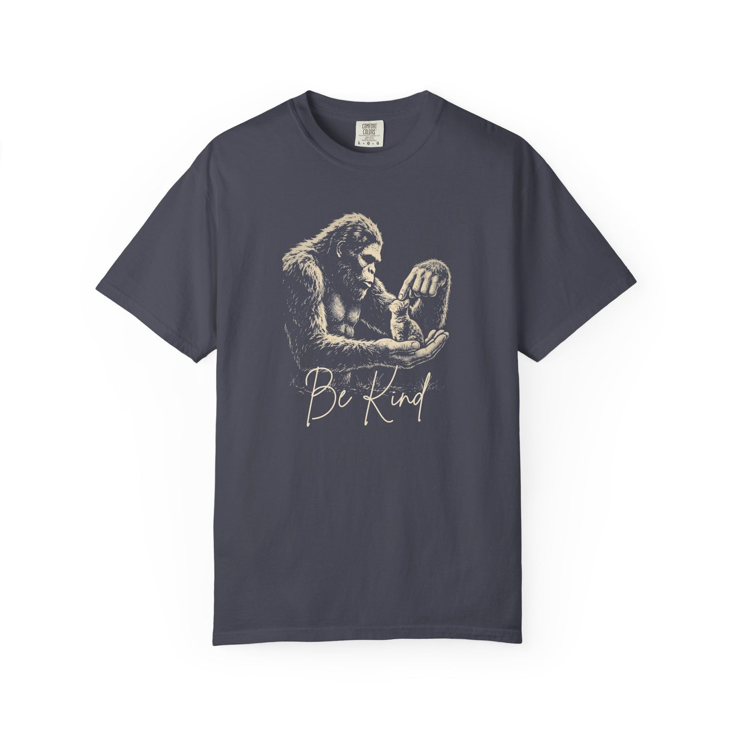 Bigfoot booping a cat on the nose graphic tee in Navy — "Be Kind" garment-dyed heavyweight shirt