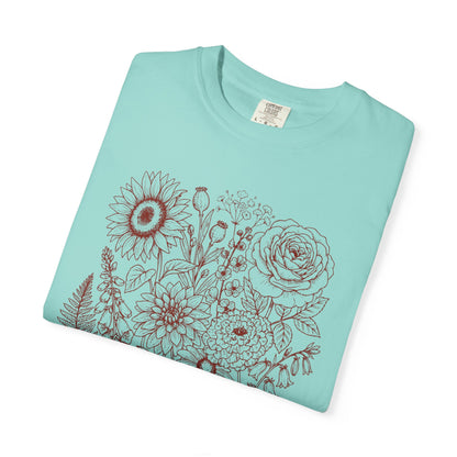 Comfort Colors® Chalky Mint shirt with hand-drawn botanical line art print featuring sunflower, rose, dahlia, and wildflowers