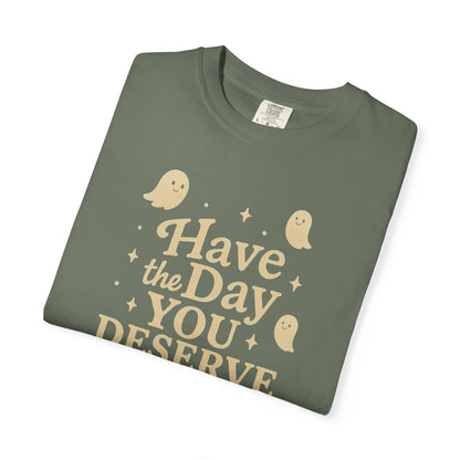 moss t-shirt with Halloween-themed design and text that says "have the day you deserve" on a white background