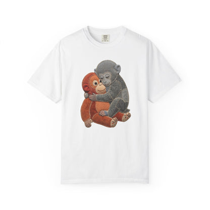 White t-shirt with two monkeys hugging on a white background