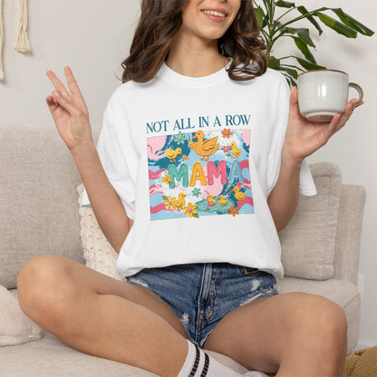 white "mama" t-shirt with colorful graphic design featuring ducks and text on a white background.