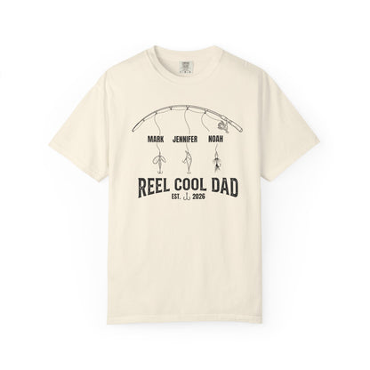 ivory t-shirt with fishing reel cool dad graphic and text on a white background