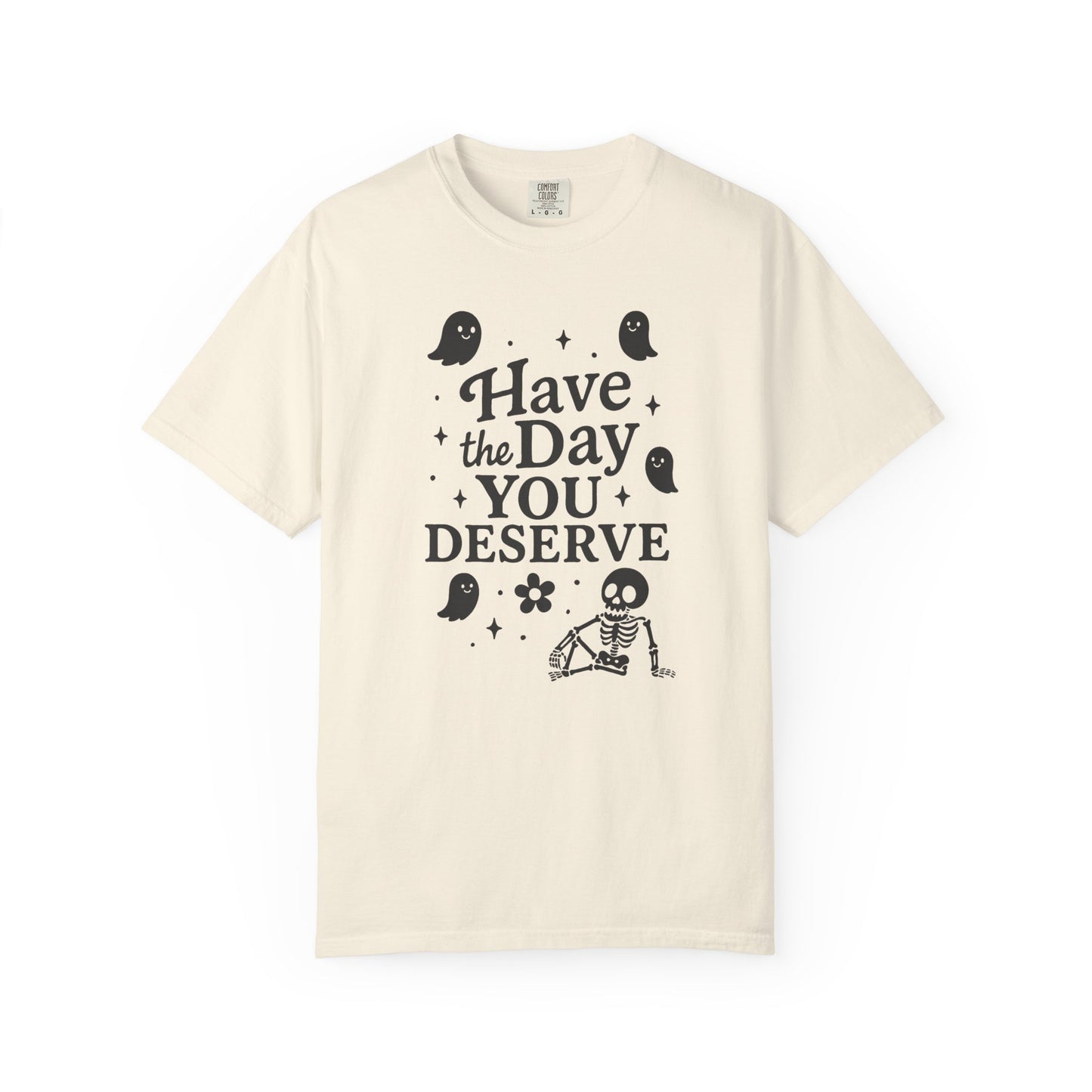 ivory t-shirt with Halloween-themed design and text that says "have the day you deserve" on a white background