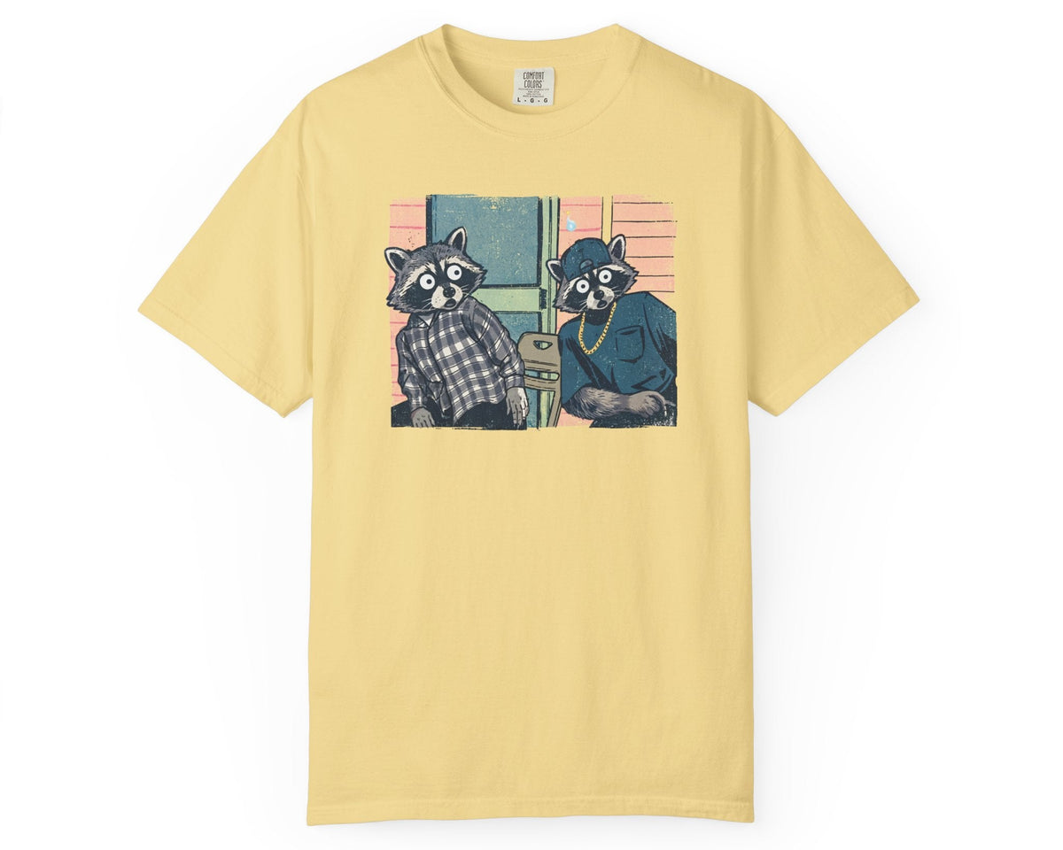 Two raccoon neighbors on a porch graphic tee in Butter, vintage pastel illustration meme design