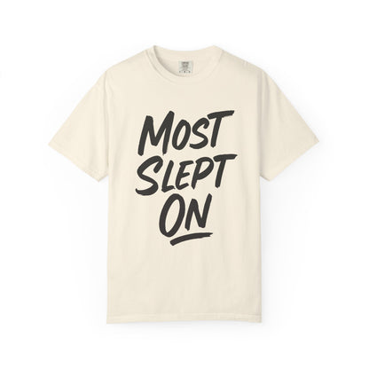 ivory t-shirt with 'MOST SLEPT ON' text in black on a white background