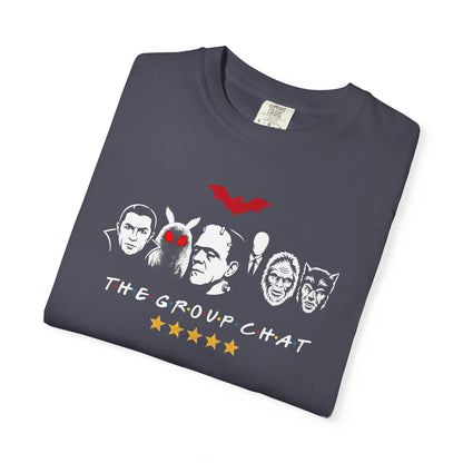 Navy garment-dyed unisex t-shirt featuring The Group Chat horror monster squad graphic — Dracula, Mothman with red eyes, Frankenstein, Slender Man, Bigfoot, and Werewolf faces with red bat above and five gold stars below