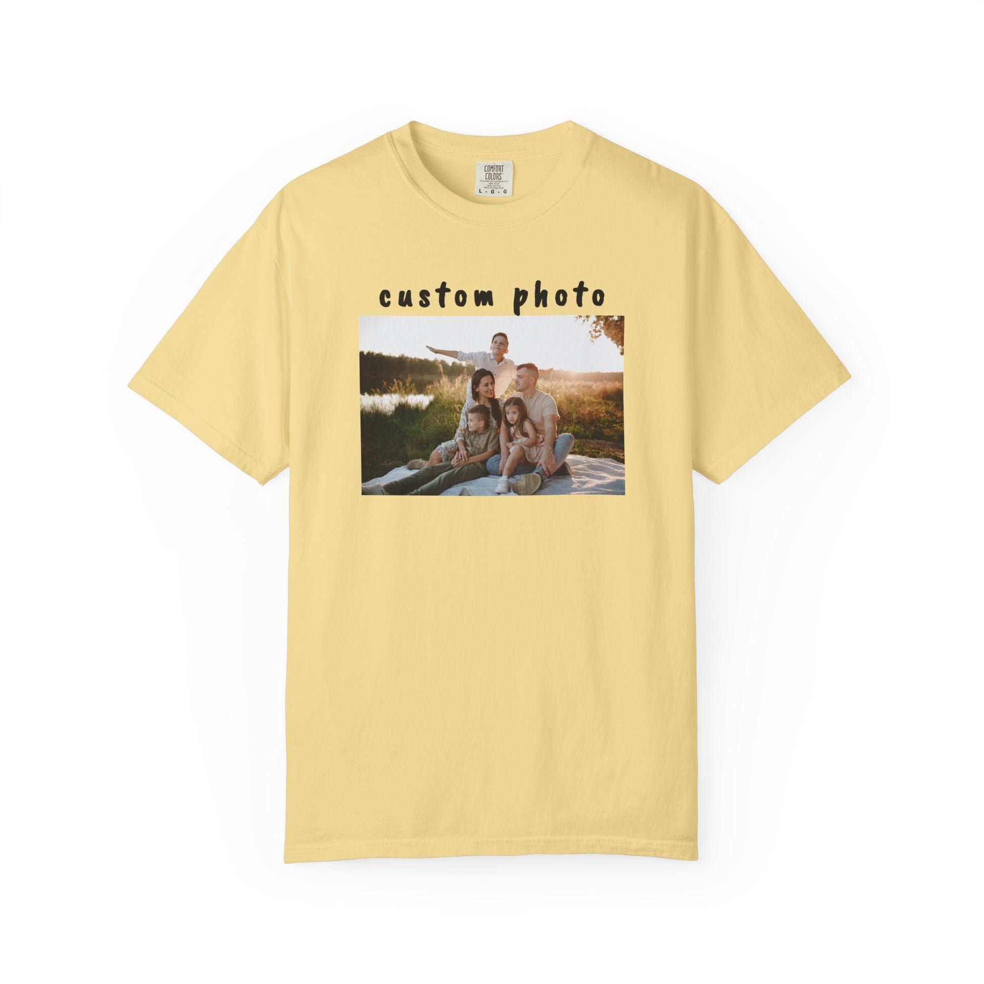bananat-shirt with a printed photo of a family by a lake on a white background
