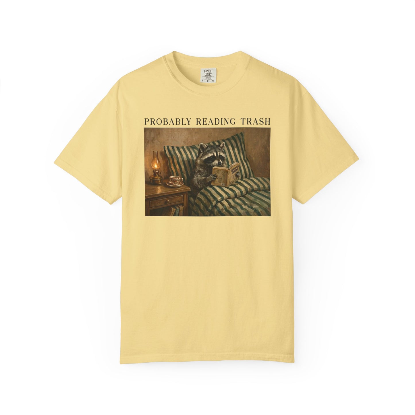 Raccoon Probably Reading Trash T-Shirt in Butter – Funny Bookish Graphic Tee