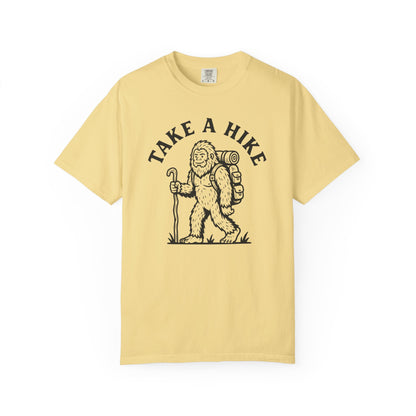 Take a Hike T-Shirt in Butter— Bigfoot hiking graphic tee