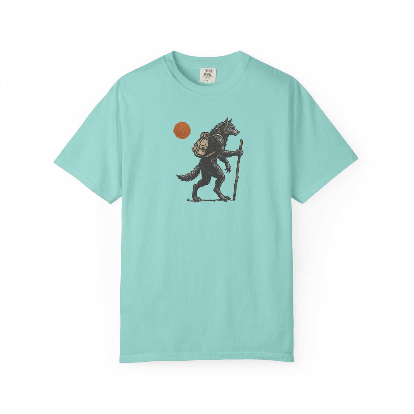 Hiking Wolf graphic t-shirt in Chalky Mint — werewolf with backpack and walking stick print on garment-dyed heavyweight cotton tee.