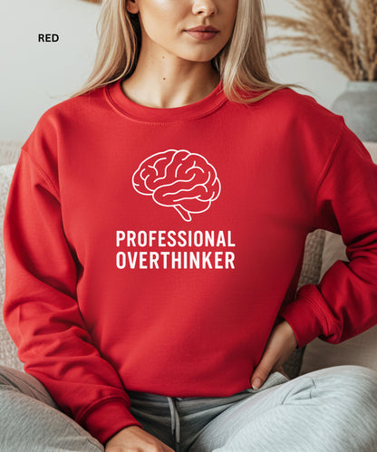 Person wearing a red sweatshirt with a brain graphic and 'Professional Overthinker' text.