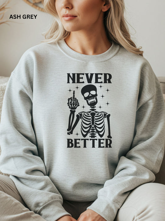 Person wearing an ash grey sweatshirt with a skeleton graphic and text that says "never better"