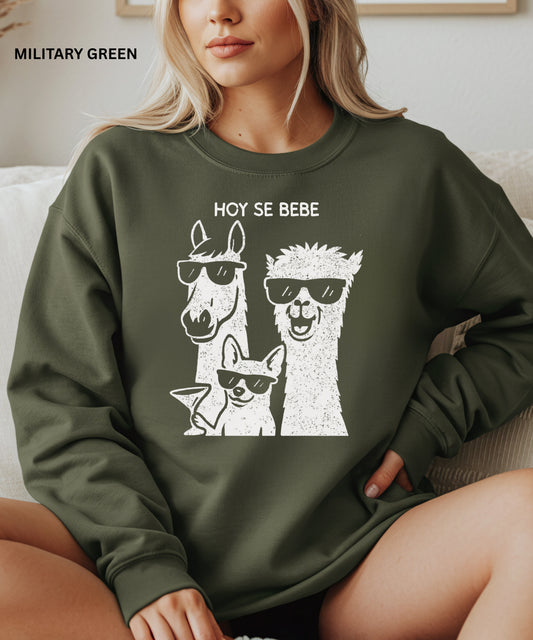 Person wearing a green sweatshirt with llama graphic and text