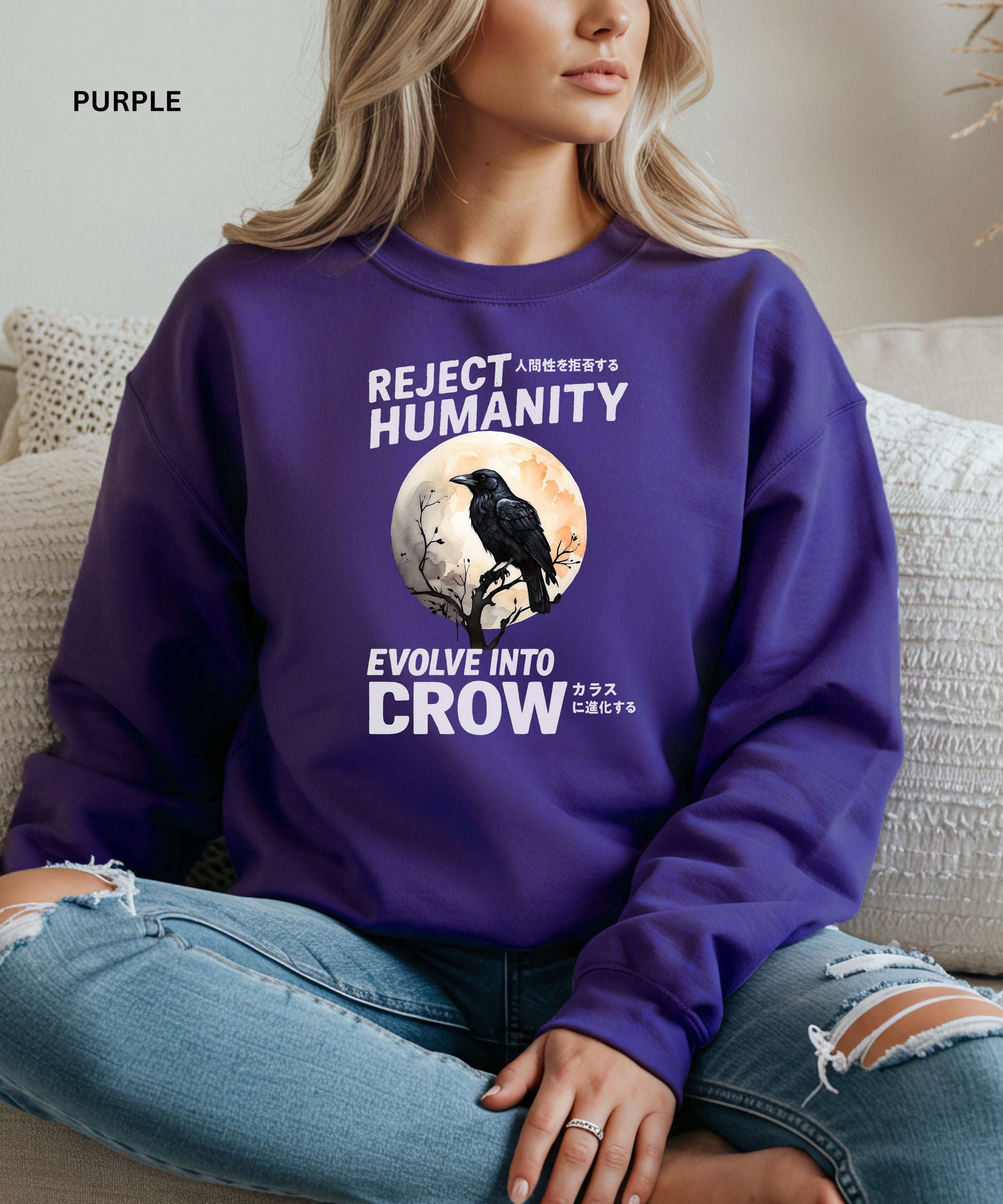 Person wearing a purple sweatshirt that says "reject humanity evolve into crow ".