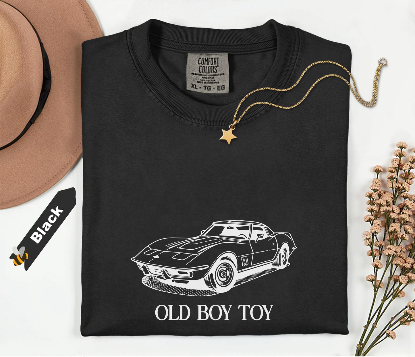 Black sweatshirt with car design and 'Old Boy Toy' text on a white background