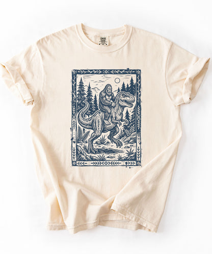Bigfoot Riding T‑Rex Comfort Colors T‑Shirt