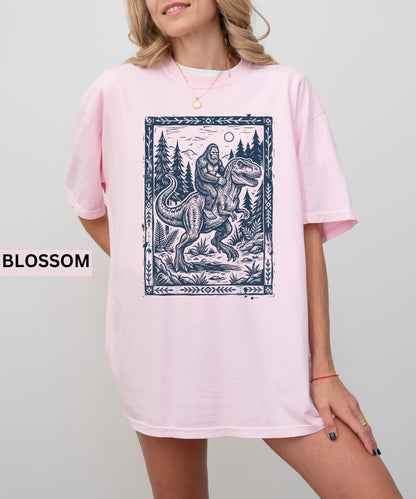 Bigfoot Riding T‑Rex Comfort Colors T‑Shirt