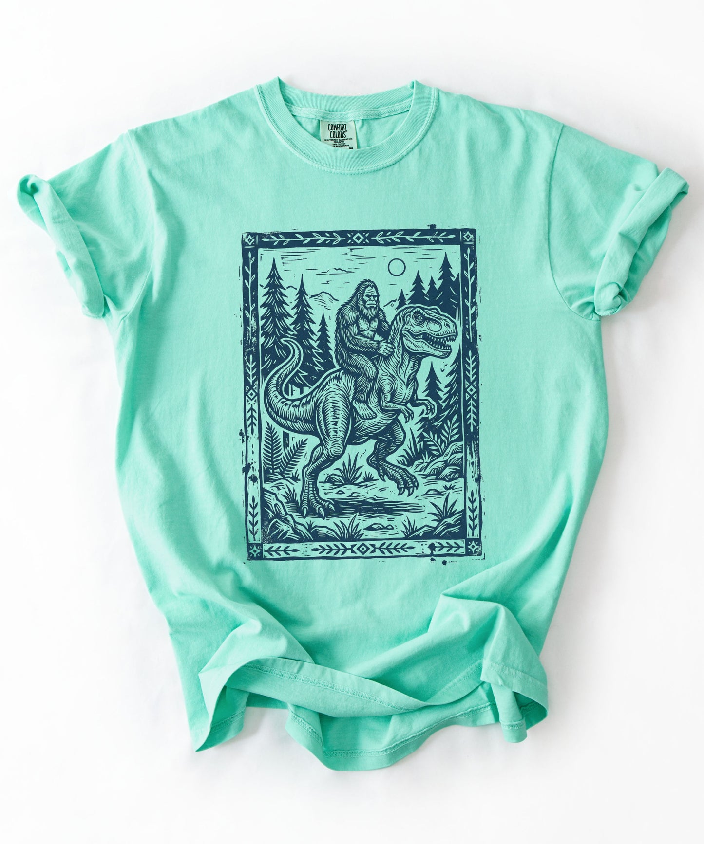 Bigfoot Riding T‑Rex Comfort Colors T‑Shirt