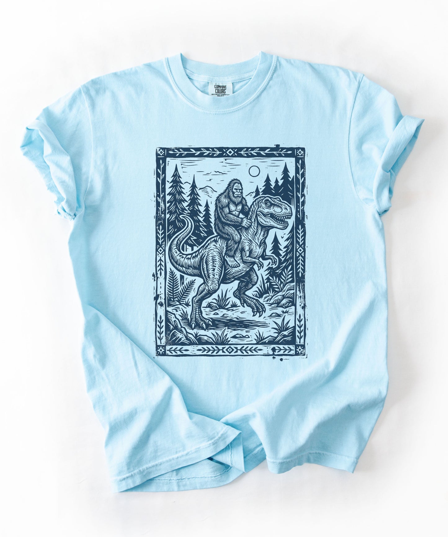Bigfoot Riding T‑Rex Comfort Colors T‑Shirt