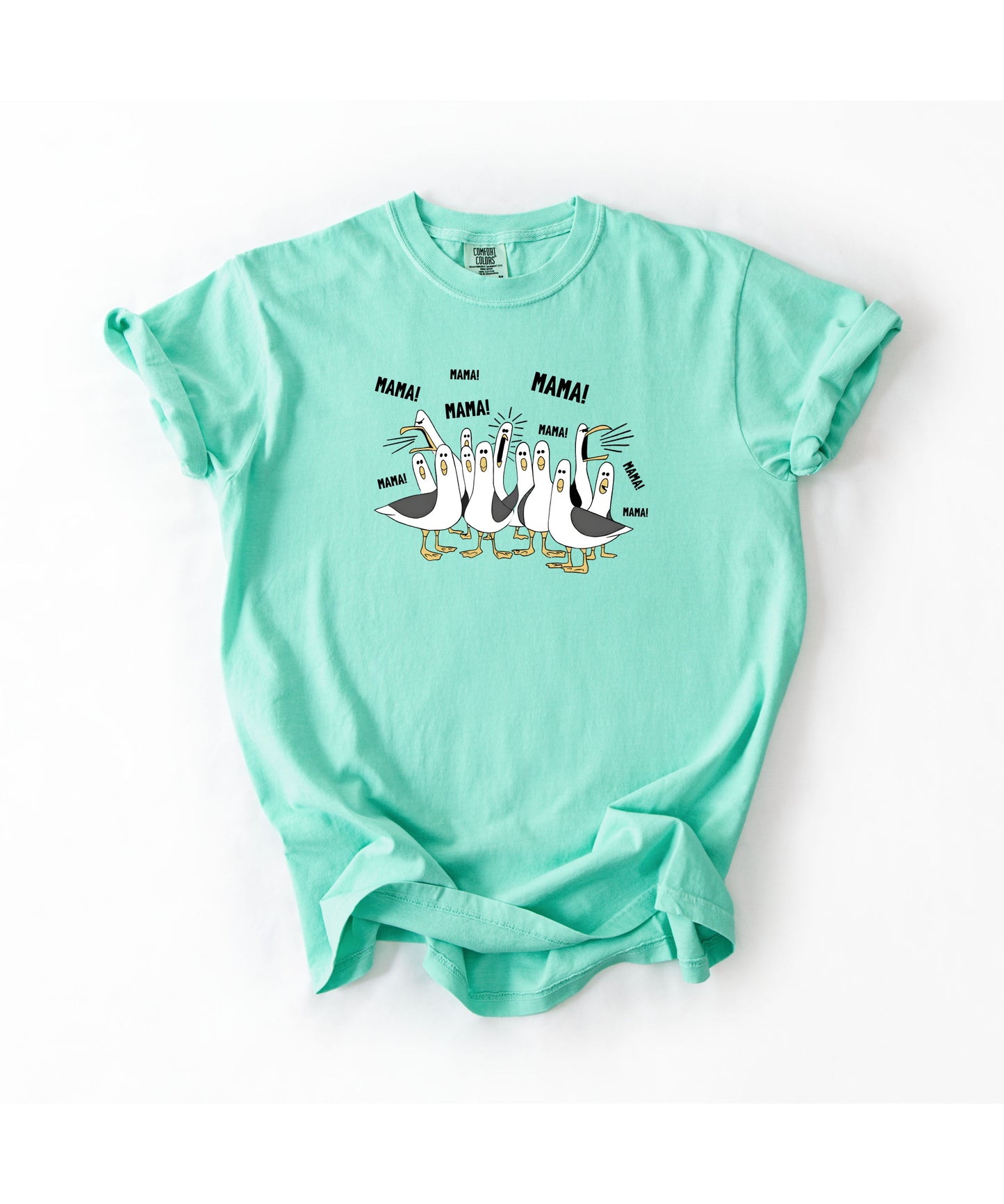 island reef  t-shirt with cartoon penguins screaming "Mama"  design and text 