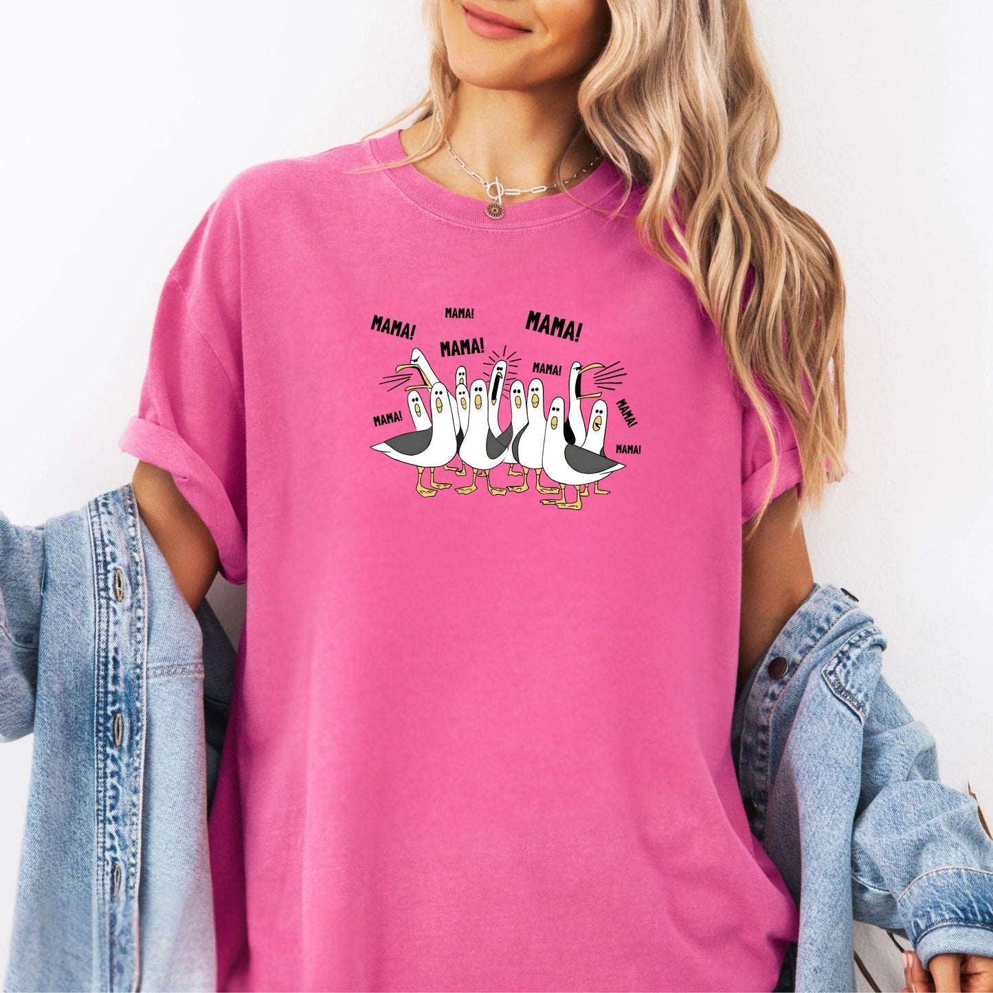 cruynchberry t-shirt with cartoon penguins screaming "Mama"  design and text worn by a person.