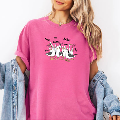 cruynchberry t-shirt with cartoon penguins screaming "Mama"  design and text worn by a person.