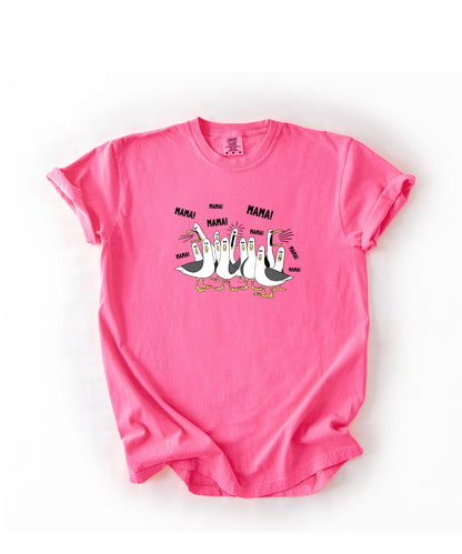 neon pink t-shirt with cartoon penguins screaming "Mama"  design and text 