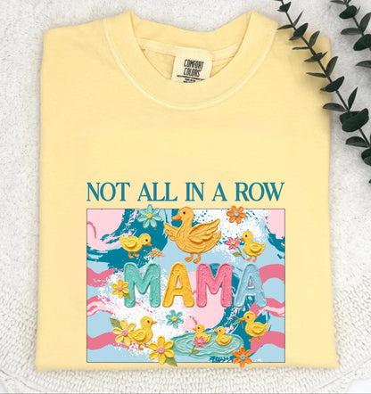 butter "mama" t-shirt with colorful graphic design featuring ducks and text on a white background.