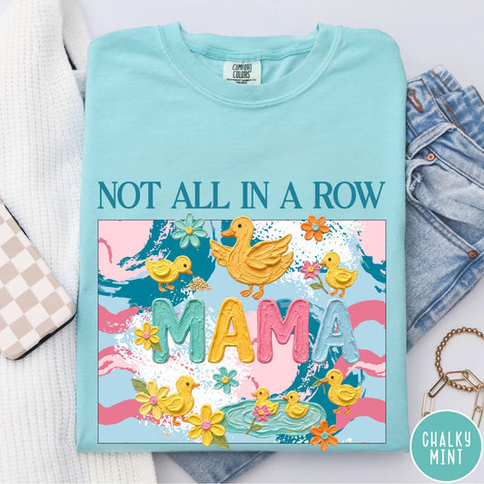 chalky mint "mama" t-shirt with colorful graphic design featuring ducks and text on a white background.