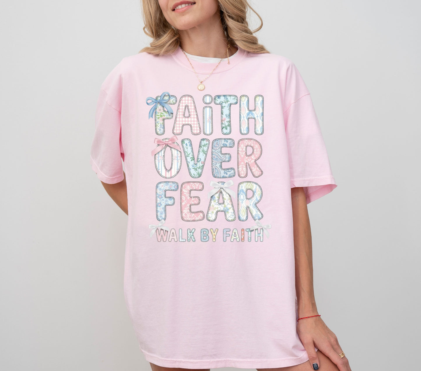 blossom t-shirt with 'Faith Over Fear' text on a plain background