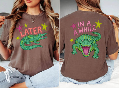 espresso t-shirts with alligator graphics on front "later gator" and the text on back i"n a while crocodile"a plain background