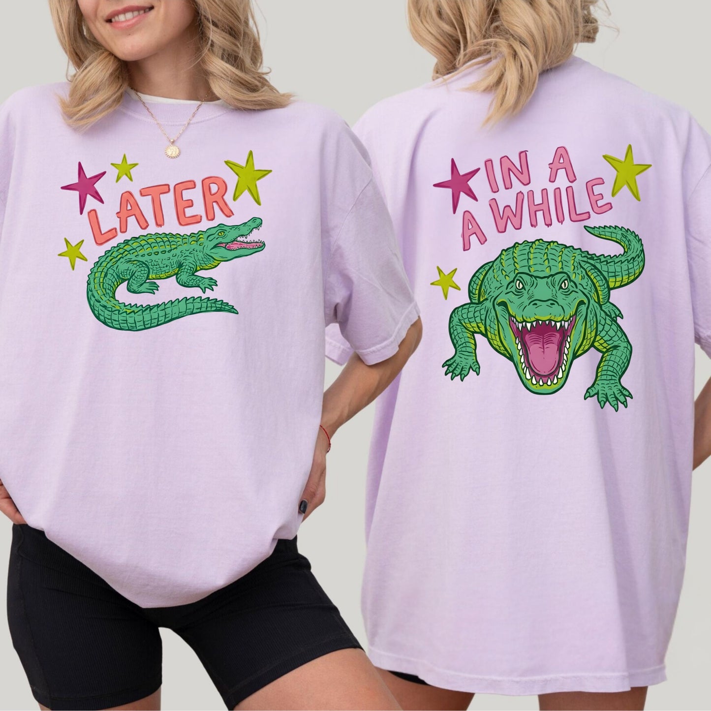 orchid t-shirts with alligator graphics on front "later gator" and the text on back i"n a while crocodile"a plain background