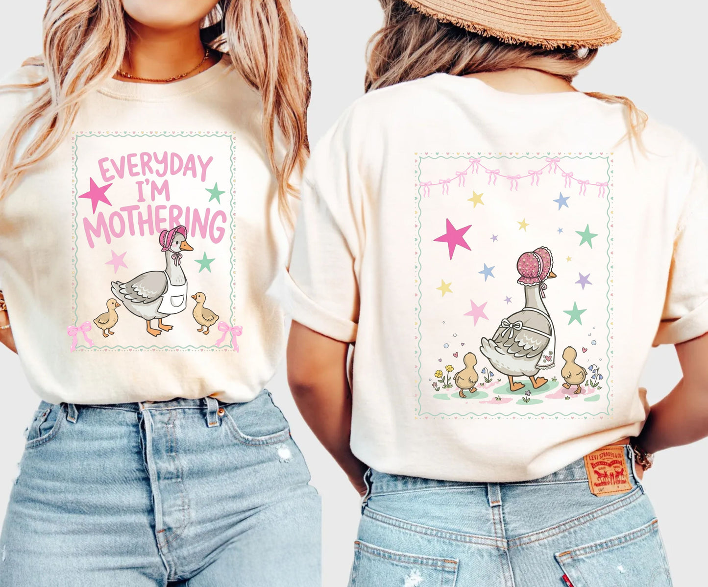 Two ivory t-shirts with front and back graphic designs of a mother goose her ducklings with phrase "everyday im mothering" and text on a white background