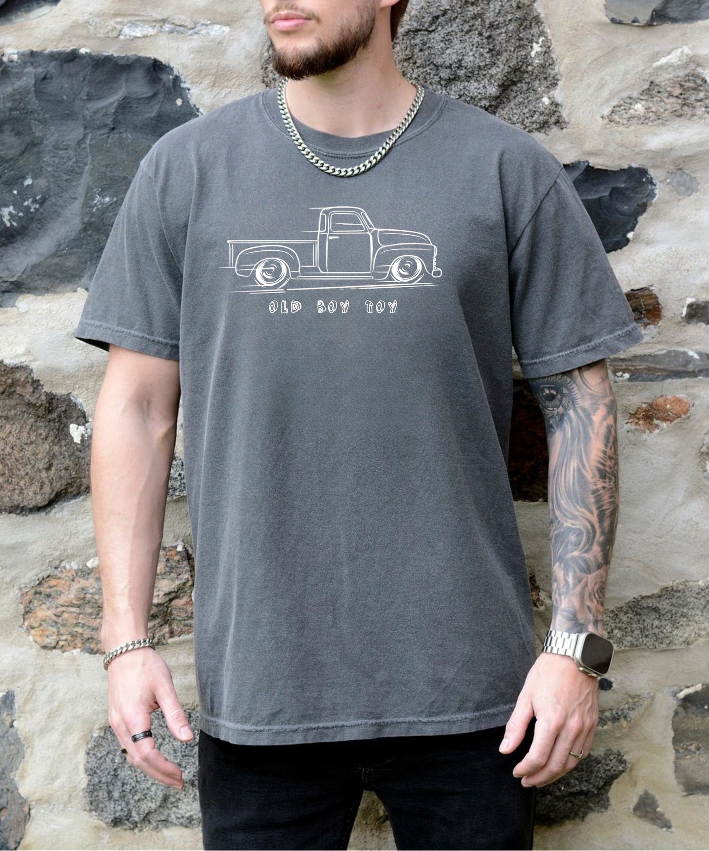 pepper t-shirt with graphic of a vintage truck text  says old boy toy on a white background