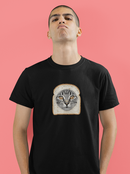 Person wearing a black t-shirt with a cat on toast graphic against a pink background